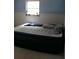 Bedroom with blue paneled walls at 14396 Pambar Ave, Port Charlotte, FL 33953