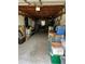 Spacious garage filled with storage containers and household items at 14396 Pambar Ave, Port Charlotte, FL 33953