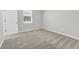 Sunlit bedroom featuring plush carpeting and a window at 15508 High Bell Pl, Bradenton, FL 34212