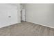Neutral bedroom featuring plush carpeting and a double-door closet at 15508 High Bell Pl, Bradenton, FL 34212