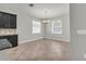 Cozy dining area with a chandelier and natural light from two large windows at 15508 High Bell Pl, Bradenton, FL 34212