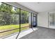 Screened lanai provides access to backyard views at 15508 High Bell Pl, Bradenton, FL 34212