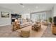 Spacious living room seamlessly connects to the kitchen, offering a comfortable gathering space at 15508 High Bell Pl, Bradenton, FL 34212