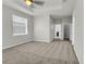 Large main bedroom featuring a fan and neutral walls at 15508 High Bell Pl, Bradenton, FL 34212