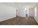 This spacious living room features wood flooring, neutral walls and plenty of natural light at 1643 35Th St, Sarasota, FL 34234