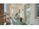 Welcoming front porch with a rocking chair, plants, and a view of the entrance at 1838 Restful Dr # K-1, Bradenton, FL 34207