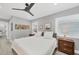 Bright bedroom showcasing neutral walls, plank flooring, and well-placed windows, enhancing its serene ambiance at 1919 Laurel St, Sarasota, FL 34236