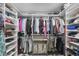 Organized walk-in closet with ample shelving and hanging space, providing practical storage solutions at 1919 Laurel St, Sarasota, FL 34236