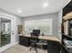 Bright home office with a large window, desk, and modern furnishings at 1919 Laurel St, Sarasota, FL 34236
