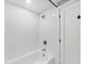 Modern bathroom with white subway tile shower and sleek, minimalist fixtures at 1919 Laurel St, Sarasota, FL 34236
