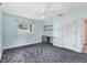 Comfortable bedroom with a small desk, neutral decor, and ample space for personalization at 2002 8Th W St, Palmetto, FL 34221