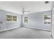 Well-lit bedroom with neutral paint, offering a serene space adaptable to various decor styles at 2002 8Th W St, Palmetto, FL 34221