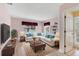 A cozy living room with comfortable seating, ample natural light, and stylish decor, perfect for relaxation at 2002 8Th W St, Palmetto, FL 34221