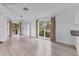 Bright living room featuring hardwood floors, ample natural light, and neutral walls at 2002 8Th W St, Palmetto, FL 34221