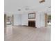 Bright living room with a fireplace, hardwood floors, and ample natural light at 2002 8Th W St, Palmetto, FL 34221