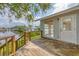 A relaxing waterfront view from wooden deck and nearby canal with lush greenery and calm water at 2002 8Th W St, Palmetto, FL 34221
