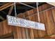 Close-up shot of the 'Barn Sweet Barn' sign adding a rustic touch at 20504 65Th E Ave, Bradenton, FL 34211