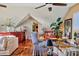 Spacious attic bonus room features wood floors, bar and ample seating areas at 20504 65Th E Ave, Bradenton, FL 34211