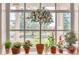Window sill with lush greenery, adding a touch of nature and serenity to the inviting space at 20504 65Th E Ave, Bradenton, FL 34211