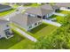 Aerial view of the home's backyard, showing the pool, fence and patio at 2105 Grand Flora Trl, Bradenton, FL 34208