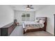 Comfortable bedroom with a ceiling fan and plenty of natural light at 2105 Grand Flora Trl, Bradenton, FL 34208