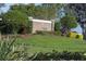 Elegant Glen Creek community sign surrounded by lush landscaping at 2105 Grand Flora Trl, Bradenton, FL 34208