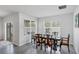 Bright dining room featuring large windows, tile flooring and plenty of natural light at 2105 Grand Flora Trl, Bradenton, FL 34208
