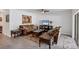 Comfortable living room featuring classic furnishings and a neutral color palette, great for relaxing at 2105 Grand Flora Trl, Bradenton, FL 34208