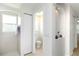 Bathroom featuring a tiled shower, toilet, and decorative shelving niche, optimizing space at 2199 Palm Ct, North Port, FL 34287
