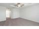 Spacious bedroom with neutral carpet and white walls at 2199 Palm Ct, North Port, FL 34287