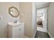 Bathroom with stylish fixtures and a decorative mirror at 2363 Milford Cir, Sarasota, FL 34239