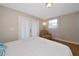 Bright bedroom featuring white curtains and comfortable chair at 2363 Milford Cir, Sarasota, FL 34239