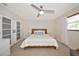 Bedroom with neutral carpet, ceiling fan, and natural light at 2363 Milford Cir, Sarasota, FL 34239
