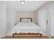 Bedroom featuring white walls and a bed with access to the balcony at 2363 Milford Cir, Sarasota, FL 34239
