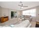 Bright living area featuring neutral décor, large windows, and a comfortable seating arrangement at 2363 Milford Cir, Sarasota, FL 34239