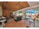 Elegant screened patio with comfortable seating, stylish decor, and a relaxing outdoor living area at 2363 Milford Cir, Sarasota, FL 34239