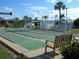 Community shuffleboard courts and outdoor seating areas for recreational enjoyment and relaxation at 2601 Gulf N Dr # B4, Bradenton Beach, FL 34217