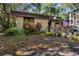 Charming home exterior featuring well-maintained landscaping and inviting entrance at 2740 Orchid Oaks Dr # 304, Sarasota, FL 34239