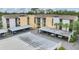 Exterior of the condo with carport parking, showcasing a well-maintained building at 2740 Orchid Oaks Dr # 304, Sarasota, FL 34239
