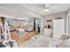 Open-concept living space with modern furnishings, light hardwood floors, and airy design at 2740 Orchid Oaks Dr # 304, Sarasota, FL 34239