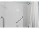 Shower with safety bar and white tile at 2740 Orchid Oaks Dr # 304, Sarasota, FL 34239