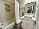 Bathroom with tub and shower combination and modern sink and vanity at 3272 Lake Bayshore Dr # 515, Bradenton, FL 34205