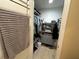 Walk-in closet with custom shelving, hanging rods, and organized storage space at 3272 Lake Bayshore Dr # 515, Bradenton, FL 34205