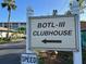 BOTL-III Clubhouse sign with directional arrow and view of the building at 3272 Lake Bayshore Dr # 515, Bradenton, FL 34205