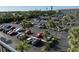 Overview of parking lot with palm trees and manicured landscaping at 3272 Lake Bayshore Dr # 515, Bradenton, FL 34205