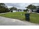 A beautifully landscaped front yard and modern single-story home at 3387 Tupelo Ave, North Port, FL 34286