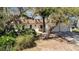 Charming single-story home with a well-maintained yard and beautiful mature trees at 3428 Mineola Dr, Sarasota, FL 34239