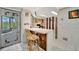 Cozy kitchen featuring a breakfast bar, tile floors and access to the outdoor patio at 3428 Mineola Dr, Sarasota, FL 34239