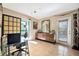 Home office space with tile floors and easy access to the outdoors at 3428 Mineola Dr, Sarasota, FL 34239