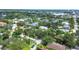 Neighborhood aerial view highlighting charming homes, mature trees, and streetscapes at 3837 Camino Real, Sarasota, FL 34239